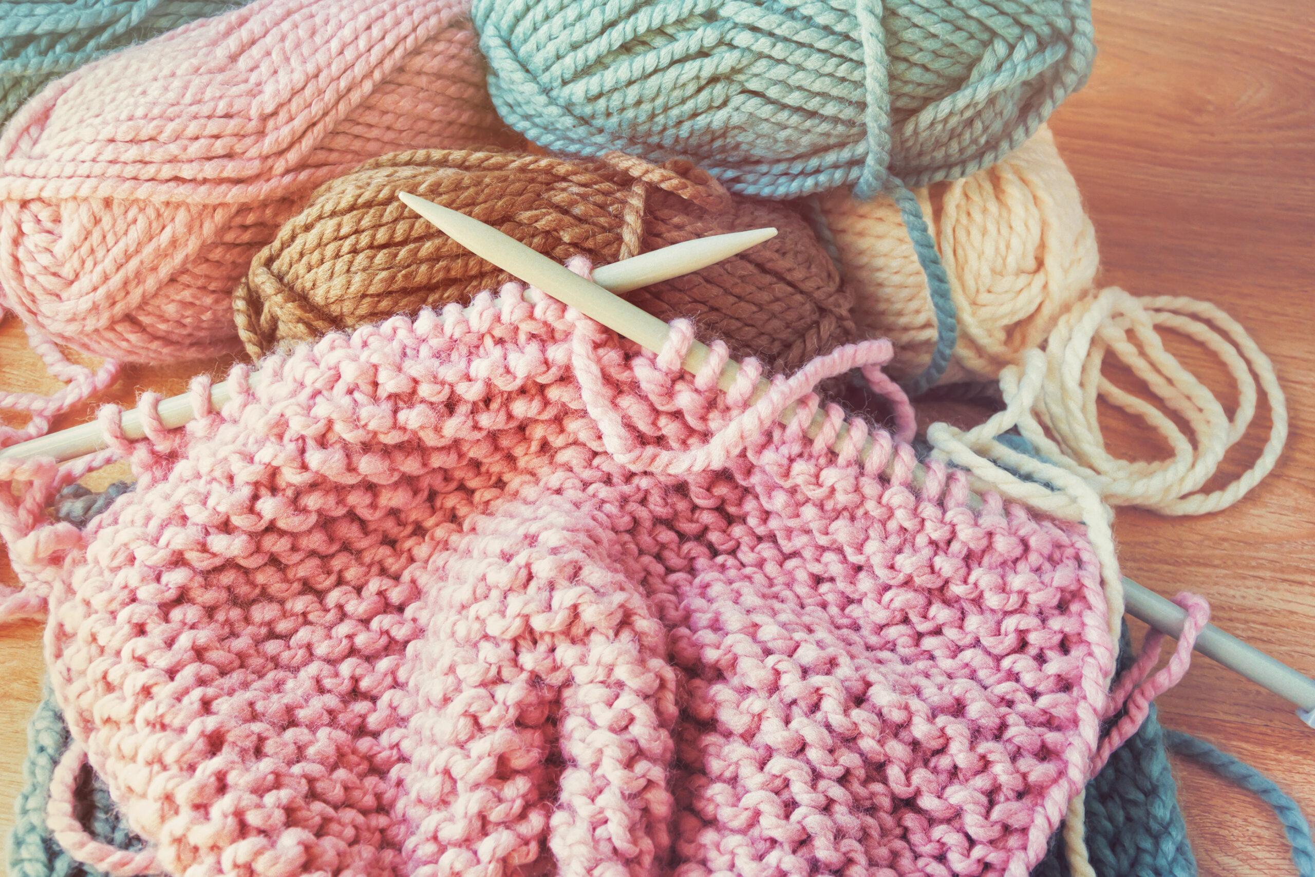 Close up of yarn and knitting