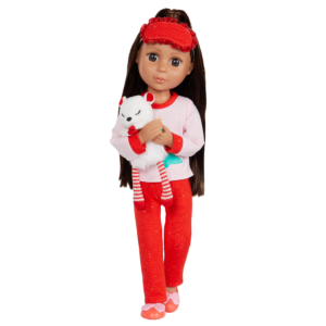Doll wearing holiday pajamas with stuffed animal