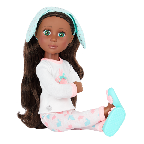 14-inch posable doll with brown hair and green eyes in sitting position