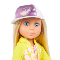 close-up of doll with hat and yellow jacket