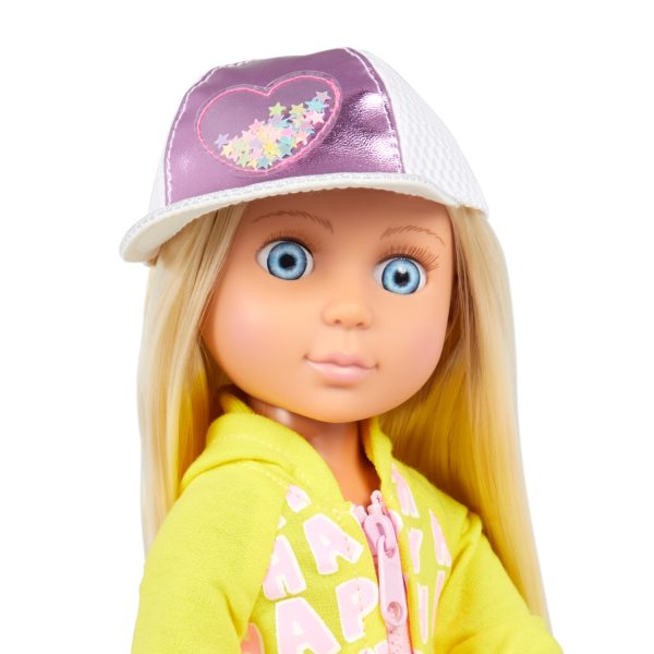 close-up of doll with hat and yellow jacket