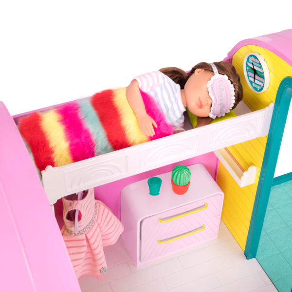14-inch doll sleeping in caravan home playset