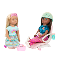 Two 14-inch dolls with salon chair and spa accessories