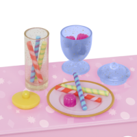 Glitter straws and cup of candies